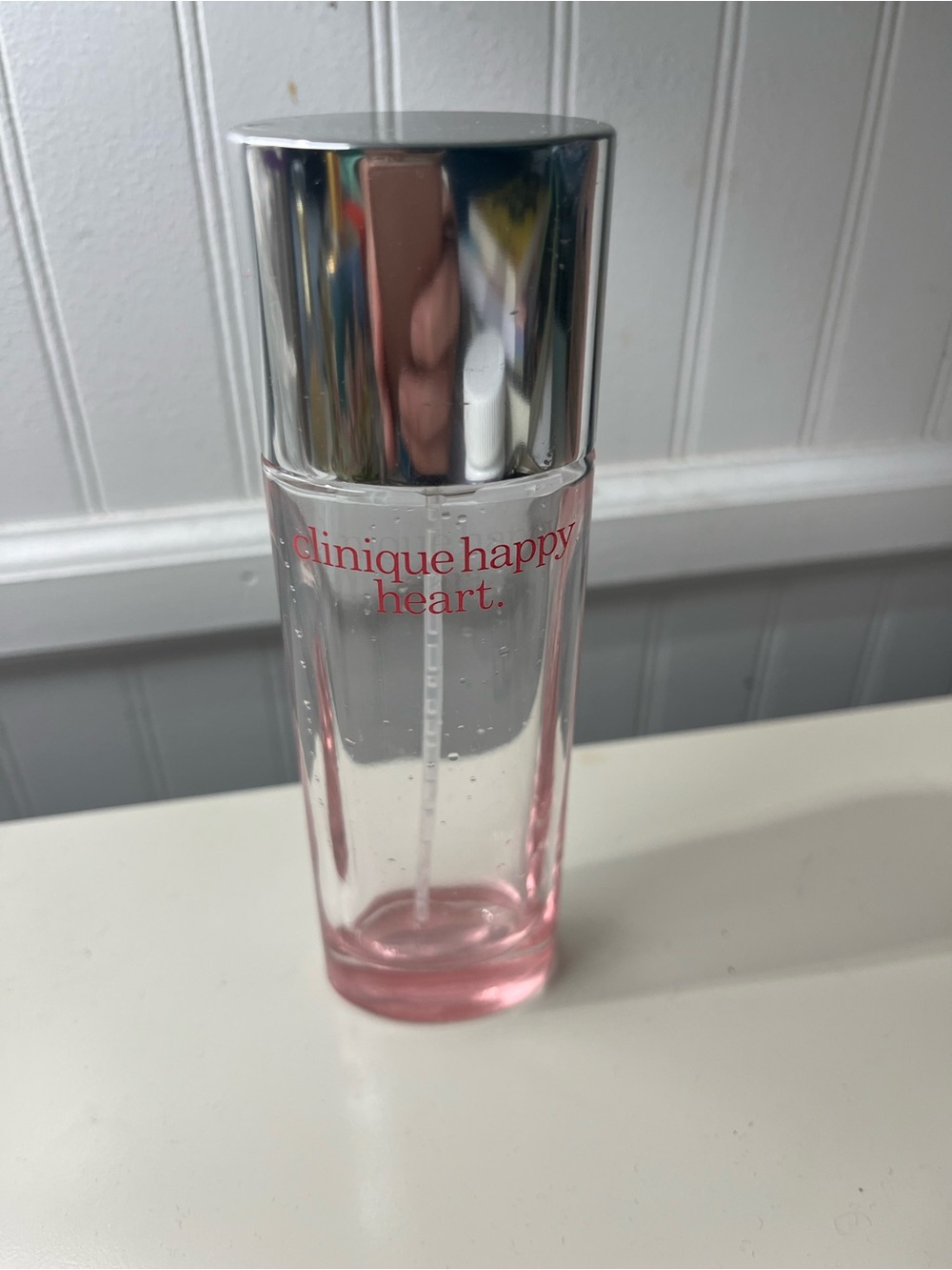 Clinique Happy Heart Clear Bottle with Pink Base and Silver Cap